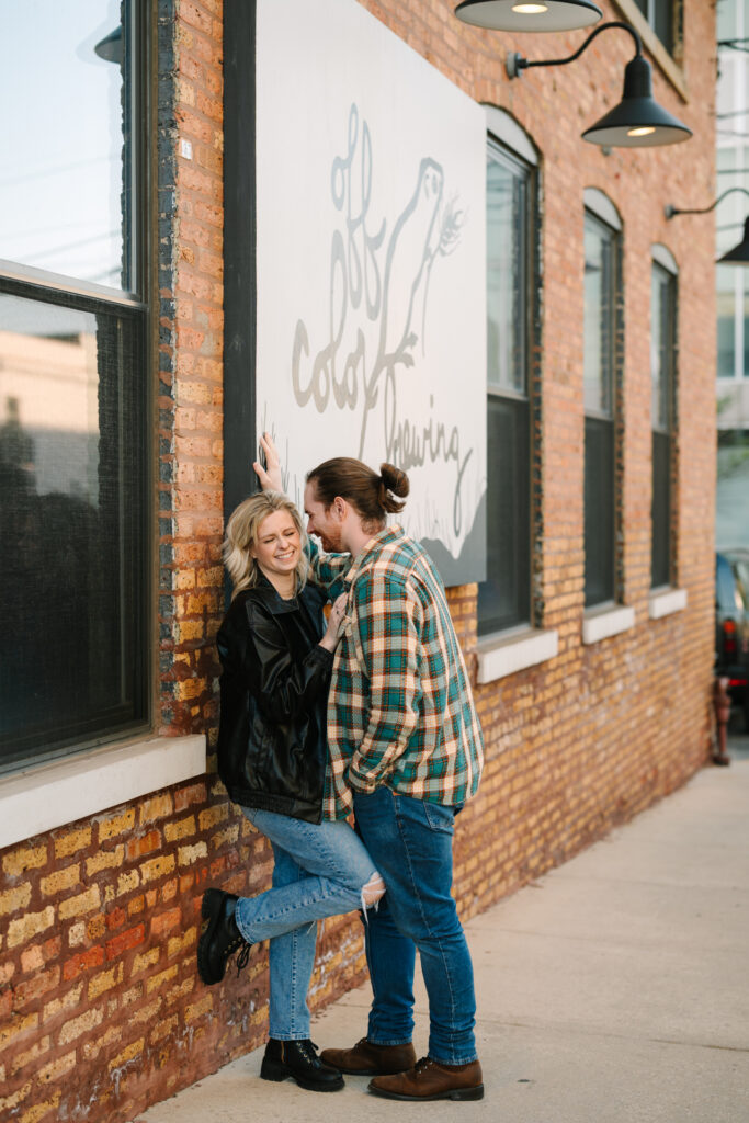 Engaged couple at Off Color Brewing during a Chicago brewery engagement session
